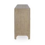 Side view showing vertical wood planks and curved leg profile of sideboard buffet