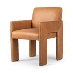 Close-up on padded letterbox-shaped armrest section with smooth stitch lines