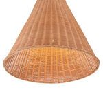 Close-up from below showing open bottom of bell-shaped rattan weave with light on inside