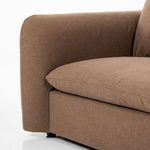 Soft rounded front edge seam and fabric texture on padded armrest