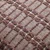 Close-up of Poe Burgundy Pillow textured geometric burgundy pattern on front panel