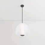 Suspended pendant light showing full drop rod and round ceiling mount against a white ceiling