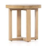 Natural nettlewood Liad End Table angled with open cross-style wooden legs visible