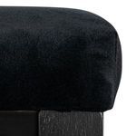 Close-up of plush black velvet upholstery on Bramblewood Arm Chair showcasing soft texture.