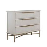 Three quarter angled view of chest highlighting ribbed drawer fronts and brass base