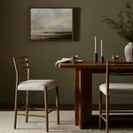 Two Glenmore Essence stools at a wood dining counter in a neutral, styled room setting