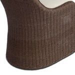 Side close-up showing the smooth, rounded base and continuous woven wicker texture