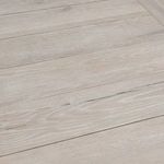 Top-down close-up of plank-style tabletop showing rich grain texture and natural markings in reclaimed oak
