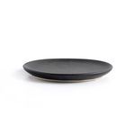 Single matte black ceramic salad plate with flat rim centered on white background
