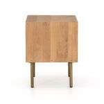 Back view showing natural oak wood panels on nightstand