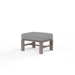 Laguna Ottoman with hand-brushed driftwood-look aluminum frame and thick grey cushion