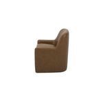 Side profile highlighting smooth curved back and integrated armrest of the leather chair