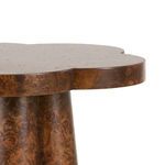 Close-up view highlighting smooth lacquered walnut burl flower-shaped tabletop edge