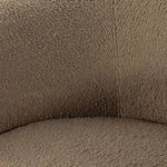 Rear view focusing on smooth uninterrupted camel fabric coverage