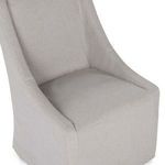 Close-up on cushioned seat and sloping armrest seam details in gray fabric