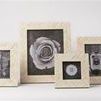 Set of four Emerson Picture Frames in varying sizes displayed with black and white photos on white background
