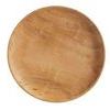 Top view showing circular form and wood grain variations of the Mame dinner plate