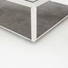Close-up of side frame edge with smooth steel surface and faint shagreen texture visible below