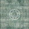 Mika Green / Mist Rug with abstract tribal design in shades of green and gray, textured yarn adds dimension