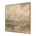 Side angle view showing the depth of the natural wood frame around the muted beige and gray seascape painting