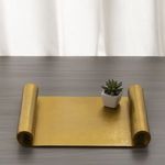 Tray placed on wooden table with small potted succulent, highlighting scale and styling