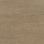Close-up of Matthes Dining Table showing wood grain texture and corner of tabletop