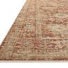 Low angle close-up showing the rug’s edge with tightly woven border and subtle blue accents in the pattern
