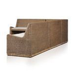 Detailed shot of rattan weave under the cushion at bench section junction