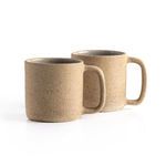 Set of two natural speckled clay coffee mugs with round shape and wide handles