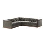 Angled front view emphasizing plush velvet cushions and wood base