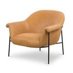 Three-quarter angle highlighting chair’s plush upholstery and frame details