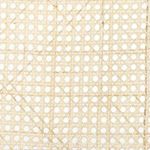 Close-up of natural cane weave pattern in the backrest of Court Dining Chair