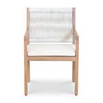 Luce outdoor dining chair with white synthetic wicker backrest, teak frame, and removable ivory cushion