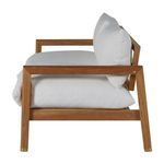 Side perspective of loveseat emphasizing plush white cushions and teak frame