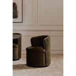 Green mohair Dane swivel dining chair with rounded back and cushion on swivel base