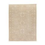 Repetition of the primary image showing full rectangular rug with central circular and square motifs