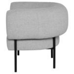 Side profile of Reina Accent Chair highlighting thick cushion and black metal leg structure
