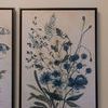 Close-up front view of Blue Meadow Reverie III painting with detailed wildflowers in various blues and ivory tones
