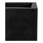 Close-up of planter corner highlighting smooth dark gray concrete texture