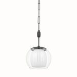 Pendant light against white background showing uniform clear glass exterior and aged brass hardware