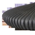 Close-up of the ribbed textured terracotta base showing a matte black granite finish with subtle rough texture