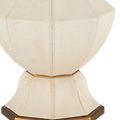 Musetta Table Lamp, front view, ivory shade lit, with black and brass hexagonal base