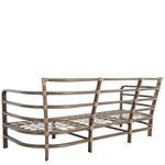 Back angled view of empty oak and rattan sofa frame with curved arms and horizontal slats