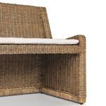 Angle showing cushion integration with rattan frame on Senna Woven Dining Bench