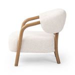 Opposite side profile focusing on the chair's clean lines and tapered wooden legs