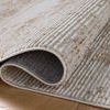 Close-up of rolled Townes Sand Beige rug corner highlighting textured ribbed pattern and weave