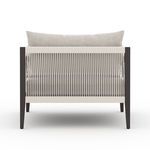 Rear view of Sherwood chair with vertical cotton rope weaving across back frame