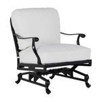 Another angled view of lounge chair with crisp white cushions on black frame
