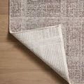 back side of Ember Fog / Dove rug folded over to reveal woven backing and plaid pattern