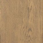 Close-up of wood grain texture on top surface in light-smoked oak finish